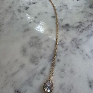 Elegant Gold Necklace with Crystal Pendant
